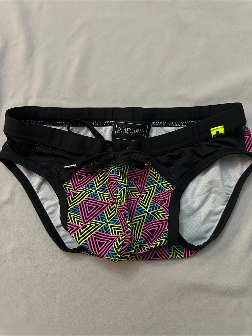 Andrew Christian Black Swim Briefs with Neon Pink, Yellow & Blue Geo Print